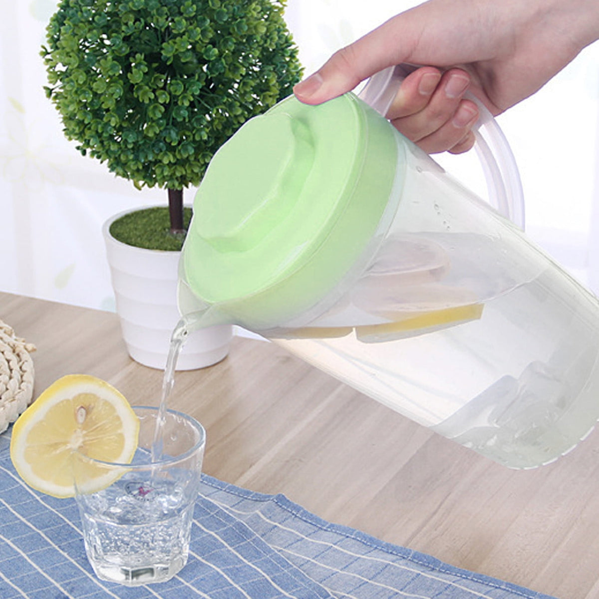 Two-Quart Serving Pitcher with Rotating Strainer Lid and Measuring Scale - Image 3